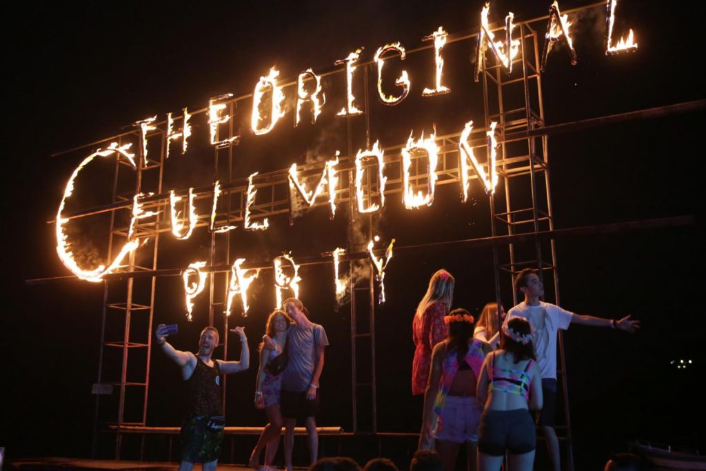 revellers enjoy themselves at the monthly Full Moon Party on Koh Phangan in Surat Thani