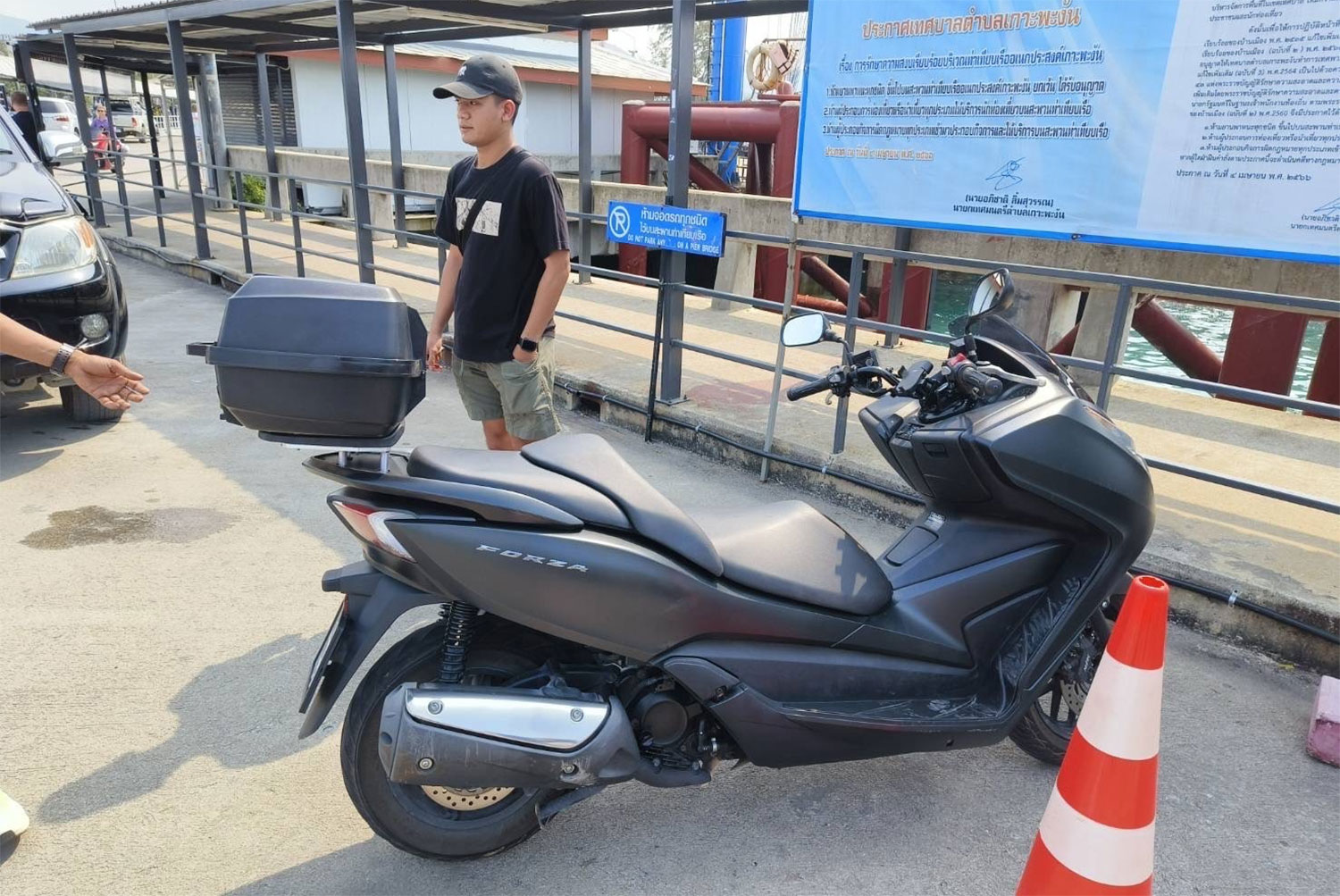 Police seize a Honda Forza 300 from a Russian man. Photo: @Bangkok Post Supapong Chaolan