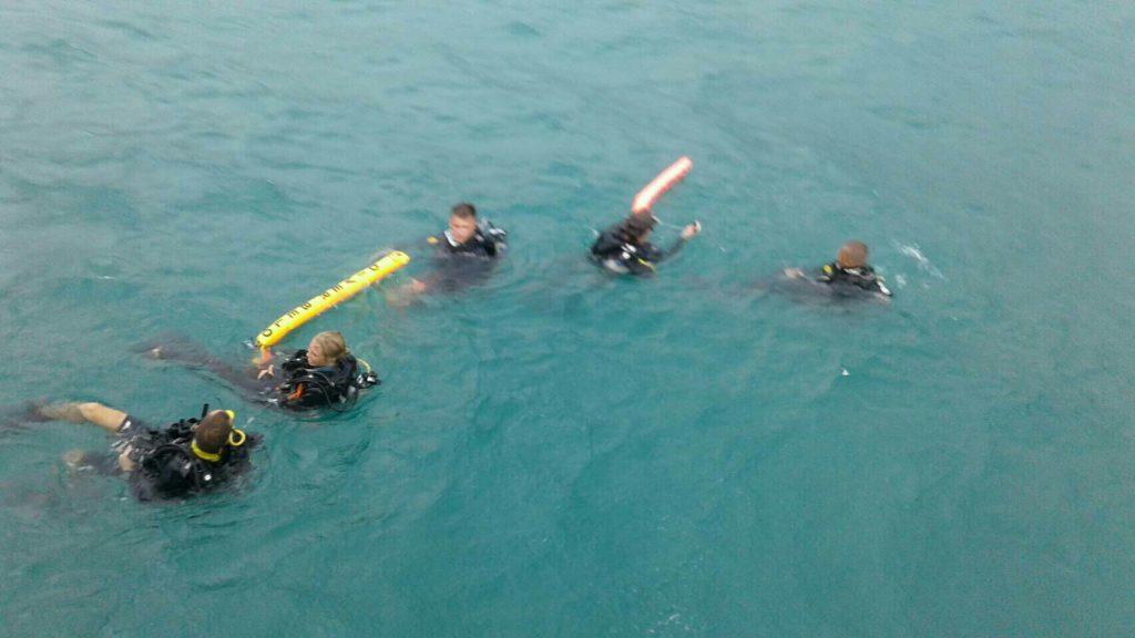 Diving instructors search for Irie Takuma on Wednesday just off Koh Phangan, where he went missing Tuesday. Photo by KhaoSodEnglish @ Asaree Thaitrakulpanich